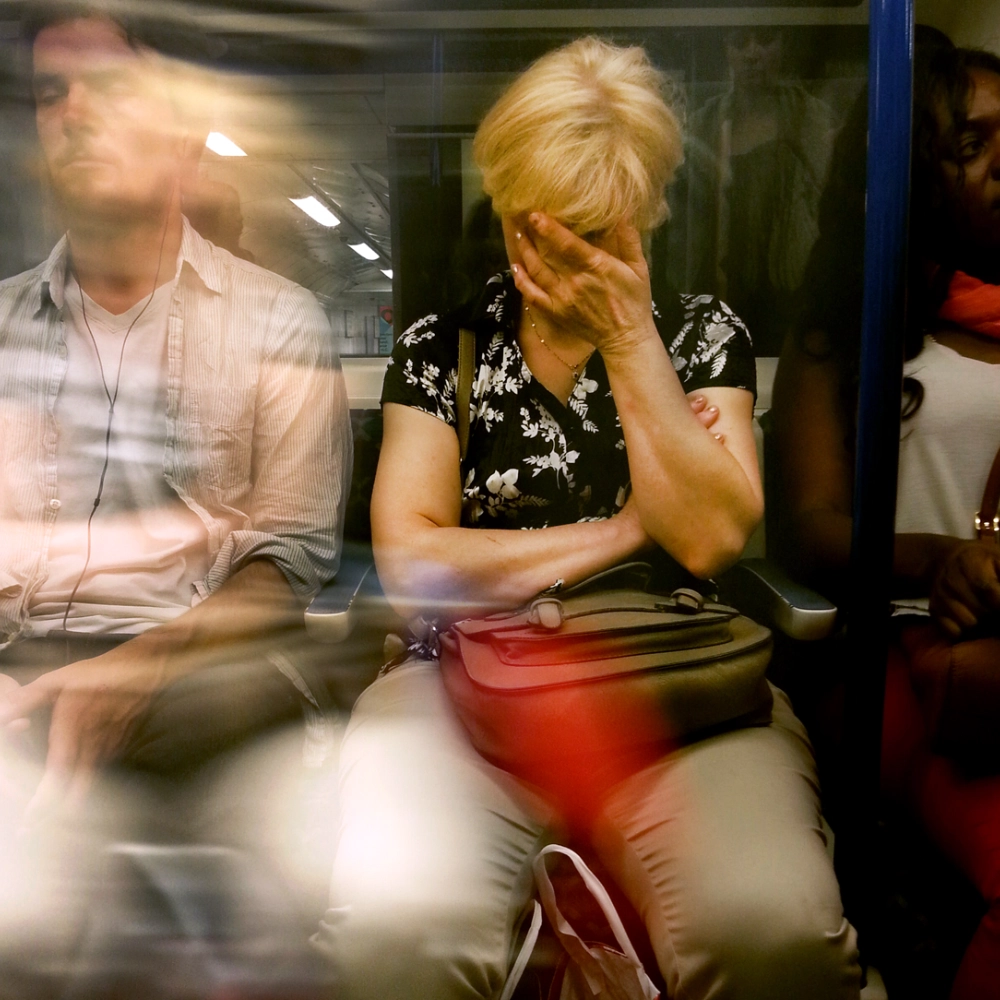 2014-06-20-ExhaustedWomanontheVictoriaLine